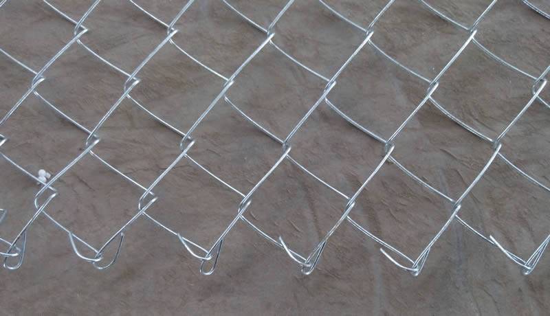 A sheet of galvanized chain link fence.