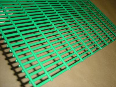 A piece of 358 security mesh fence with light-green polymer powder coating, mesh openings small than finger.
