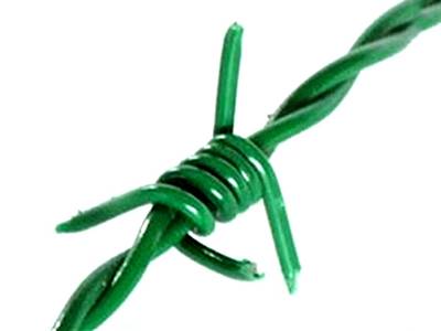 A grass green color PVC coated barbed wire on the white background.