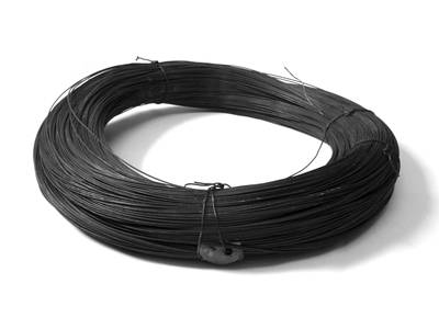 A roll of black annealed wires on the white background.