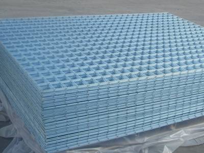 Many bright galvanized welded wire panels ready to package