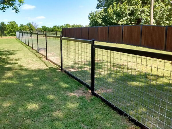 Hog wire fence panels as protective fence for farm