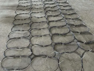 Obstacles fence laid flat on the factory floor and connected with cable ties