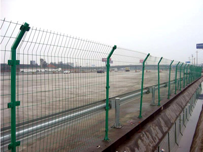 Double edge fence are installed besides of the highway.