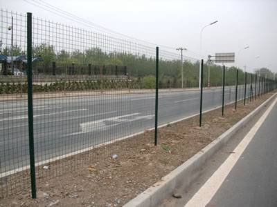 Several pieces of euro fences are installed between the passageway and motorway.