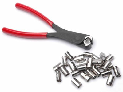 A pliers and several U clips on the white background.