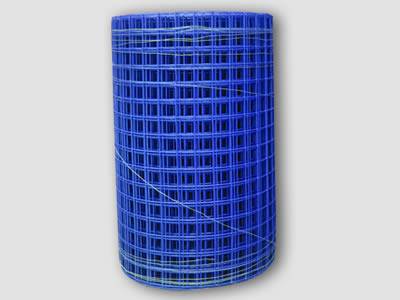 A roll of blue color welded wire mesh on the gray background.