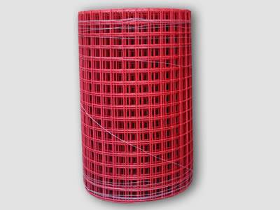A roll of red color welded wire mesh on the gray background.