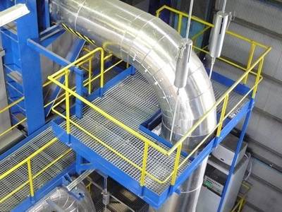 Welded steel grating are installed in the factory workshop.