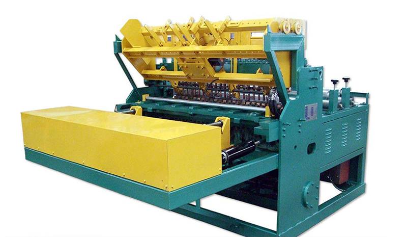 An automatic welded mesh machine on the ground.